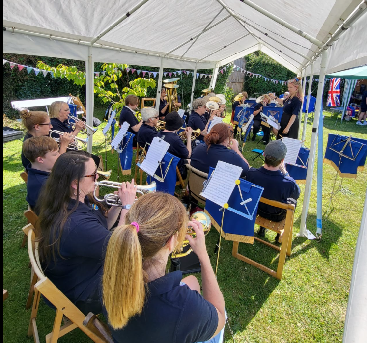 Screenshot 2025-05-18 201231 Bratton Brass Band playing at a fete